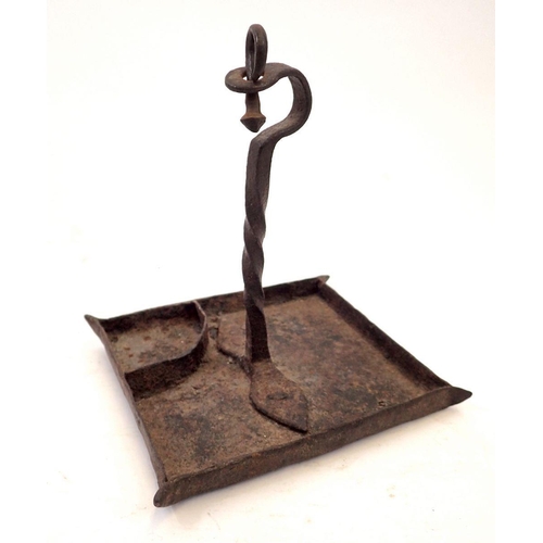 753 - A 17th/18th century blacksmith made wrought iron rush light drip tray 14cm tall