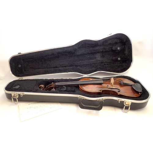 757 - An 18th century French violin with two piece back and later German scroll, cased - 14