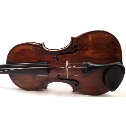 757 - An 18th century French violin with two piece back and later German scroll, cased - 14