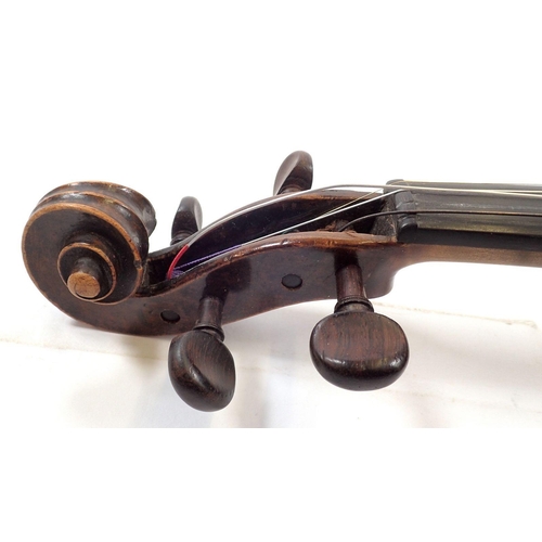 757 - An 18th century French violin with two piece back and later German scroll, cased - 14