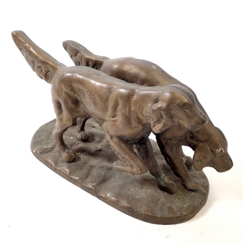 760 - A heavy bronze finish group of two retrievers, 26cm long