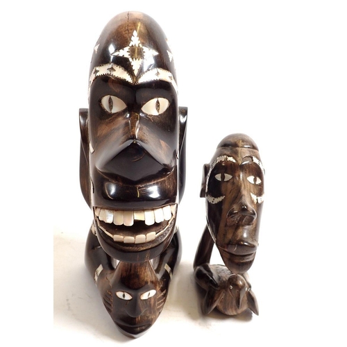 763 - Two Nguzu Nguzu ebony and mother of pearl masks from the Solomon Islands, the Roviana tribe, largest... 