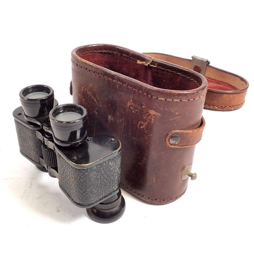 769 - A pair of 19th century small field glasses in leather case