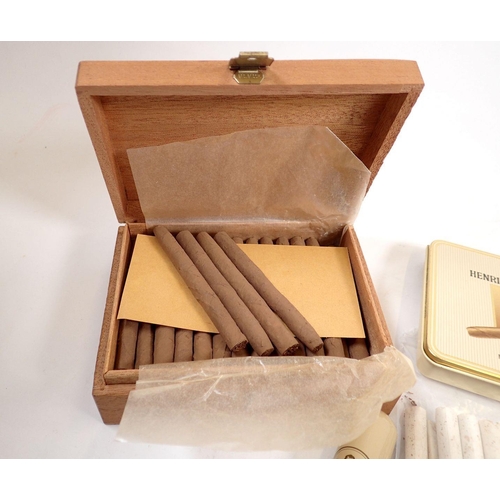 797 - A collection of smoking paraphernalia including a wooden box of Meccarillos cheroots, Henri Winterma... 