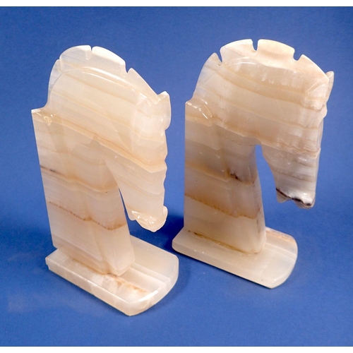 808 - A pair of alabaster horse book ends, 15.5cm