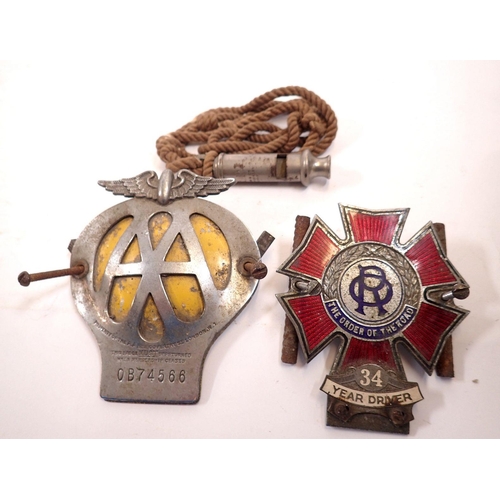 831 - Two old car badges and an ARP whistle