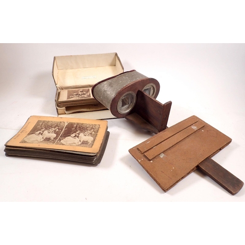 836 - A stereoscope viewer and quantity of cards