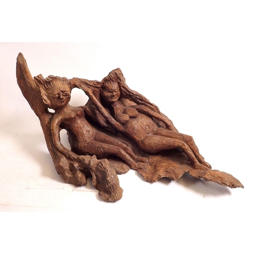 844 - An Italian root carving of two nudes, 46cm wide