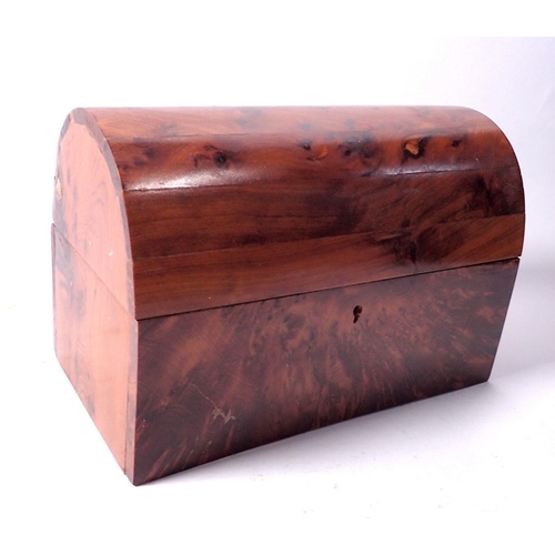 854 - A burr wood dome top box with key, 22cm wide