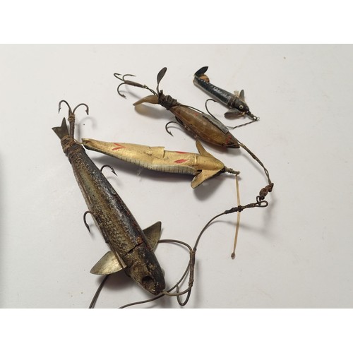 834 - A collection of fishing items including various lures, three Hardy Bros the 'Solidae' Dapping silk l... 