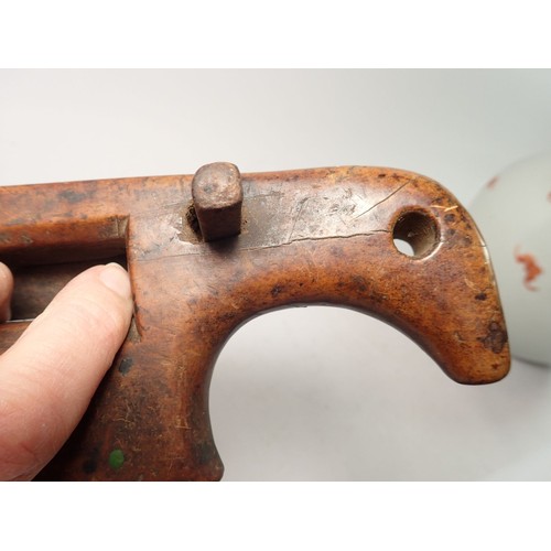 845 - An antique fruitwood convex spoke shave, 28cm wide