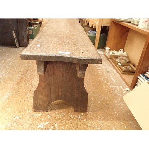 1289 - An old oak bench, 122cm long, 35cm tall