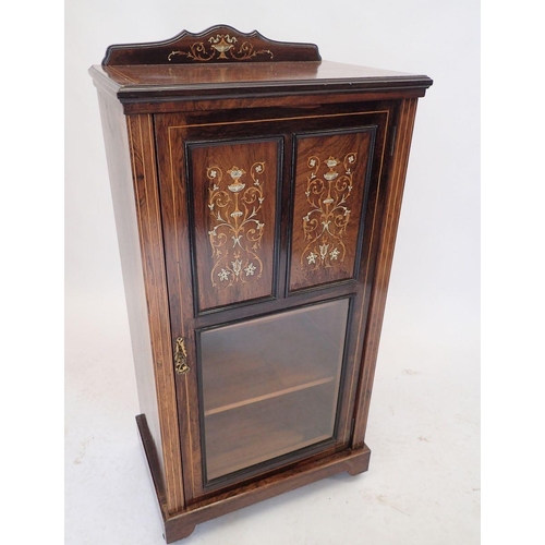 1060 - An Edwardian mahogany small cabinet with marquetry and simulated ivory decoration to half glazed doo... 