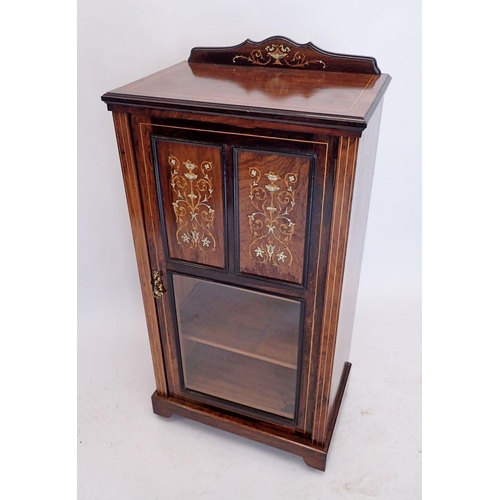 1060 - An Edwardian mahogany small cabinet with marquetry and simulated ivory decoration to half glazed doo... 