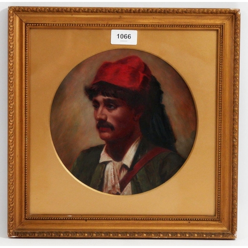 1066 - A 19th century oil portrait of an Italian man on red stoneware plate, framed and glazed, 222cm diame... 