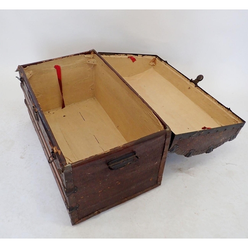 1079 - An iron and wood bound dome top trunk, 77cm wide