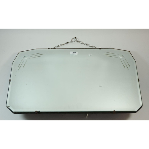 1097 - An Art Deco frameless wall mirror with incised decoration, 60 x 38cm