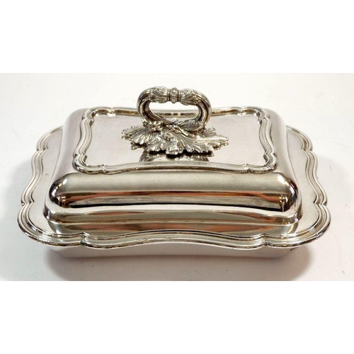 156 - A Victorian silver plated entrée dish with foliate handle