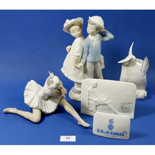 17 - A collection of Lladro to include a ballerina, a boy and girl holding hands, a Lladro society scroll... 