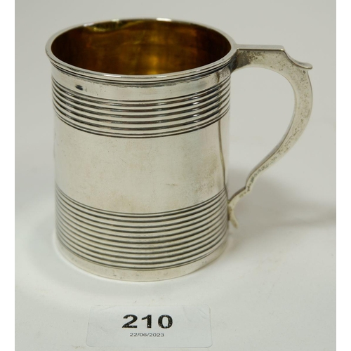 210 - A Georgian silver child's mug with reeded decoration, London 1827 by Edward Barton, 118g, 7.5cm