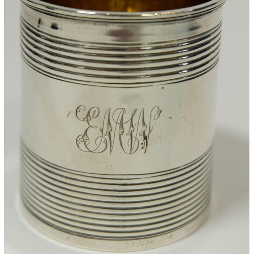 210 - A Georgian silver child's mug with reeded decoration, London 1827 by Edward Barton, 118g, 7.5cm