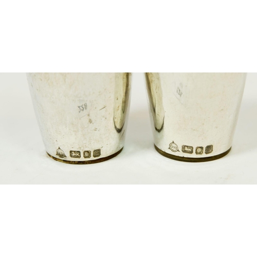 228 - A handmade silver modernist pair of salt and pepper pots, London 1960 by RFC, 227g, 11cm