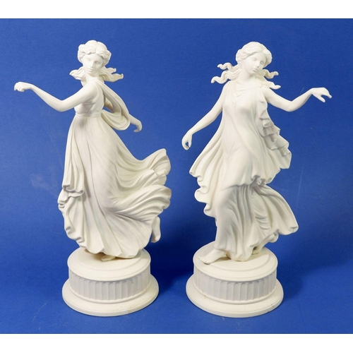 28 - A pair of Wedgwood Dancing Hours figures, 24cm tall