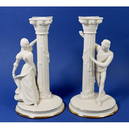 30 - A pair of Franklin Mint Romeo & Juliet candlesticks, 25cm