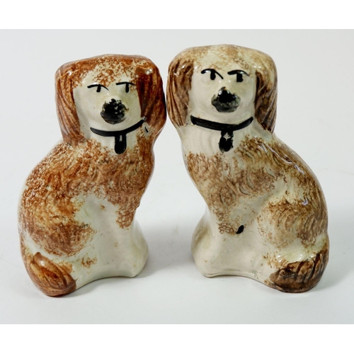 33 - A pair of small Staffordshire brown sponged dogs, 12cm high