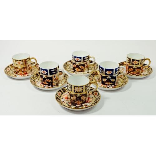 35 - Six matched early 20th century Imari pattern Royal Crown Derby coffee cups and saucers