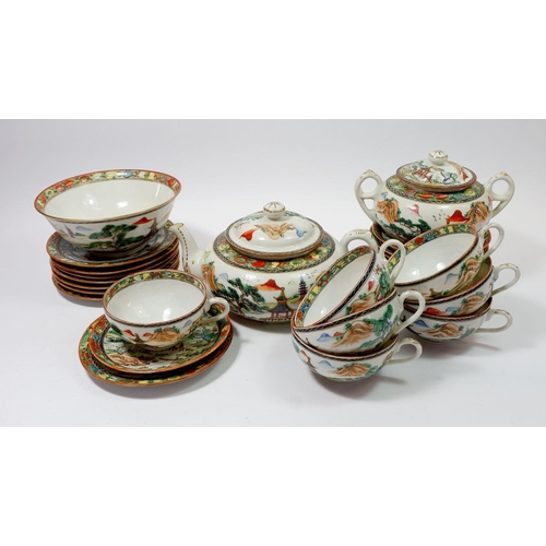 48 - A Japanese teaset comprising  teapot, lidded two handled sugar bowl, seven cups, eight saucers and a... 