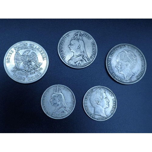 604 - A quantity of silver content coins including: USA trade dollar 1877 San Francisco Mint, German state... 