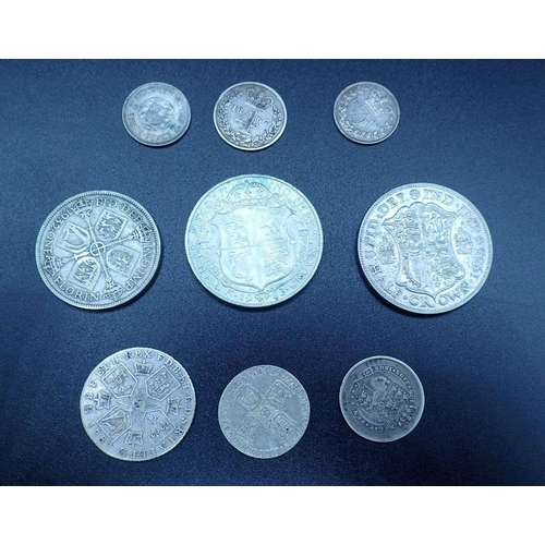 608 - A quantity of silver content coinage including: George II 1757 sixpence, George III 1787 shilling, G... 