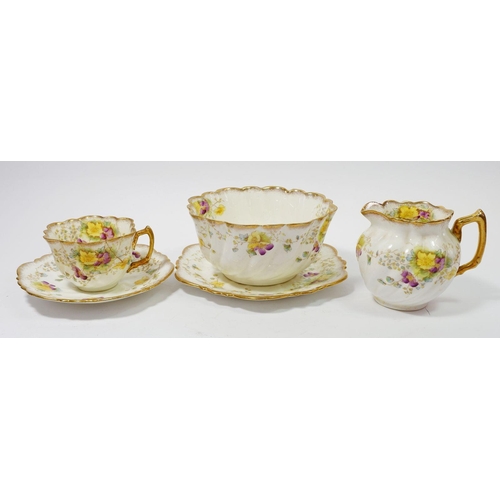 63 - An Edwardian Balmoral china tea service decorated flowers comprising twelve cups and saucers, tea pl... 