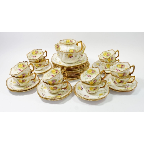 63 - An Edwardian Balmoral china tea service decorated flowers comprising twelve cups and saucers, tea pl... 