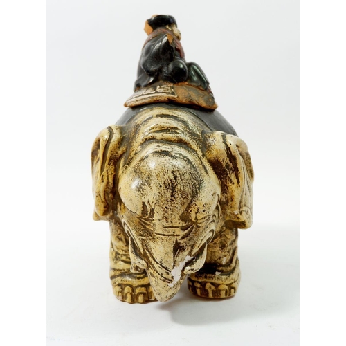 72 - A late 19th century Chinese decorative elephant pot with seated mandarin lid 'San Po Kioto' dated 18... 