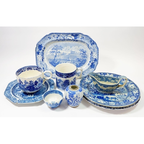 76 - A Victorian small meat plate, three early 19h century blue and white plates, sauce boat and two mugs... 