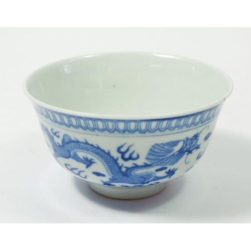 84 - A Chinese blue and white bowl decorated dragon, 12cm diameter