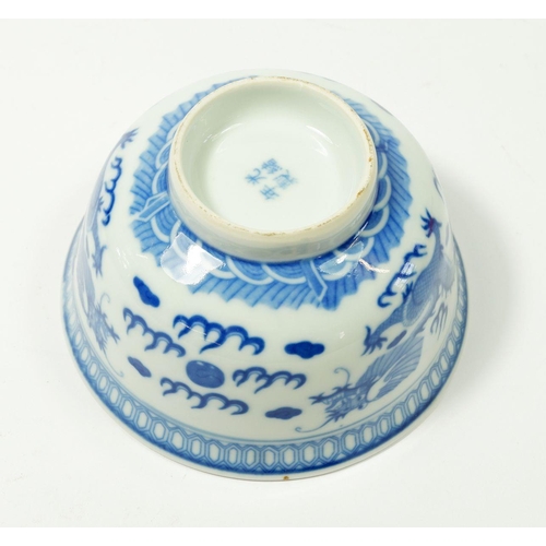 84 - A Chinese blue and white bowl decorated dragon, 12cm diameter