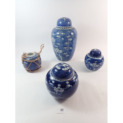 85 - Four various Chinese prunus blossom ginger jars, three with lids, large example a/f