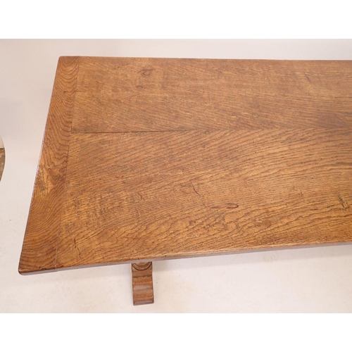 1194 - An early 20th century oak refectory style dining table on heavy turned supports, 75.5 x 183cm