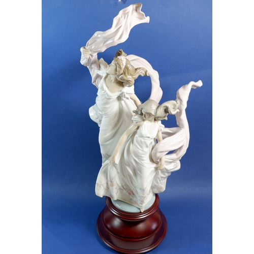 22 - A Lladro group No 5819 'Allegory of Liberty' with stand, boxed - good condition