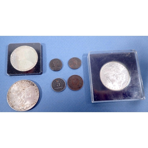 502 - A quantity of world coinage to include a cased US silver Morgan Dollar 1884, A Mexican silver Olympi... 