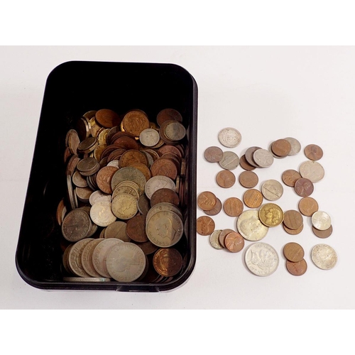 511 - A box of pre decimal and world coinage to include a number of half crowns, two shillings, shillings,... 