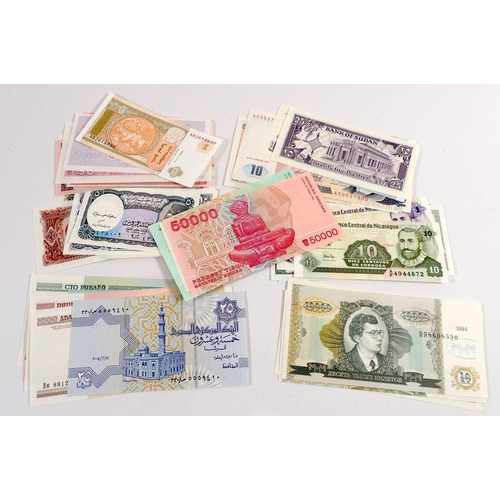 519 - A collection of approximately 60 world bank notes, condition - VF