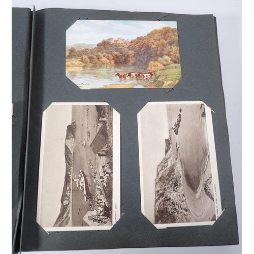 580 - A postcard album of approx 120 including greetings, topos, transport etc