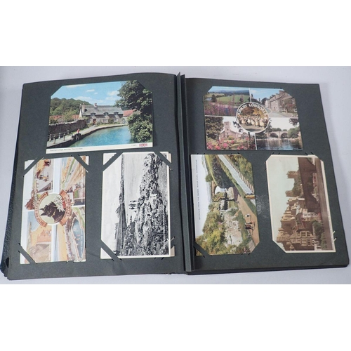 580 - A postcard album of approx 120 including greetings, topos, transport etc