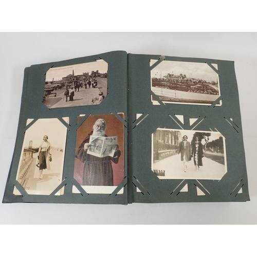 586 - A large postcard album with wide range including comic and topo (450)