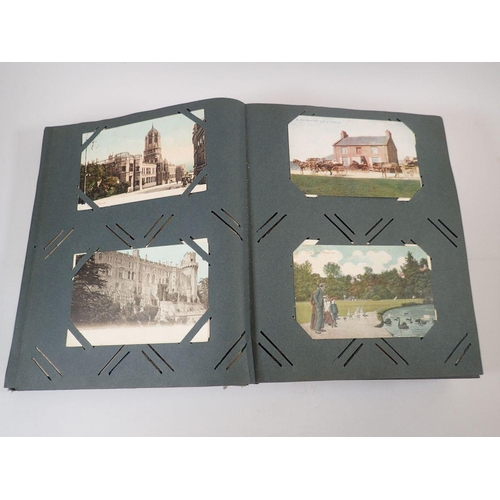 586 - A large postcard album with wide range including comic and topo (450)