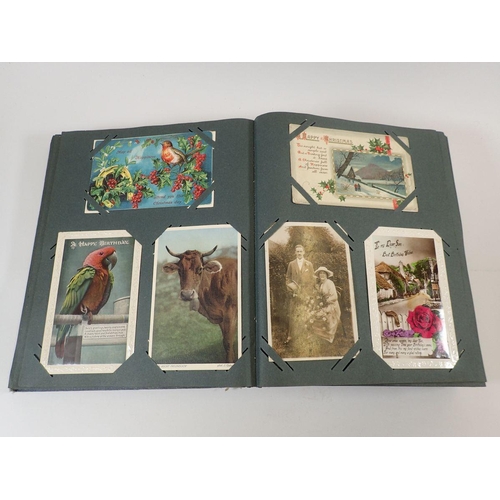 586 - A large postcard album with wide range including comic and topo (450)